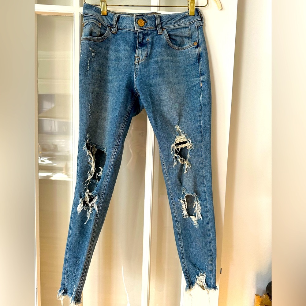 LAST CALL Distressed straight leg jeans